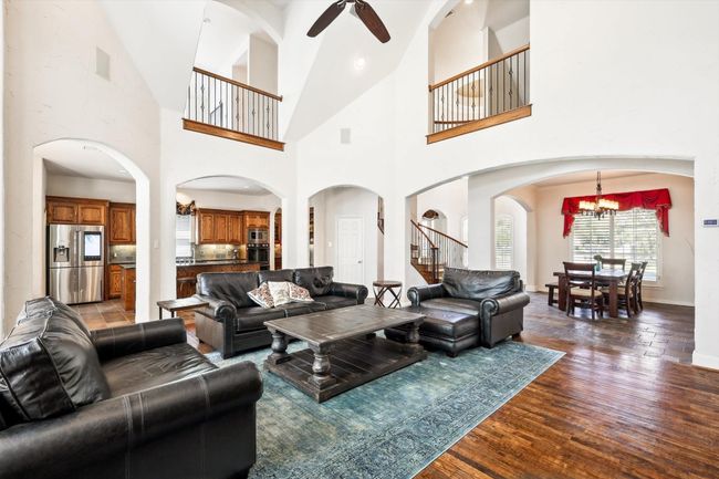Living room facing toward dining in the front of the home | Image 5