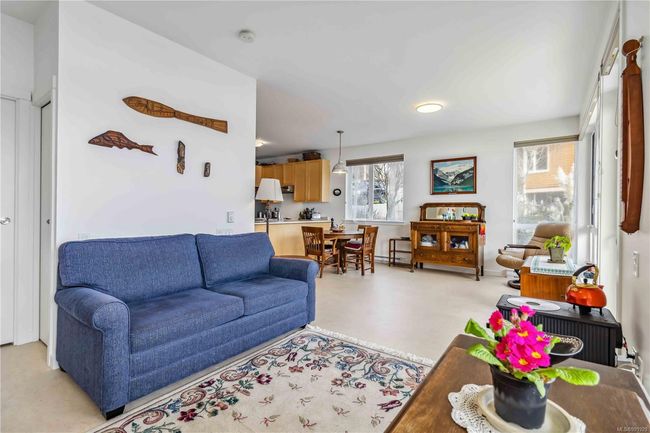 Living area featuring a wealth of natural light | Image 7