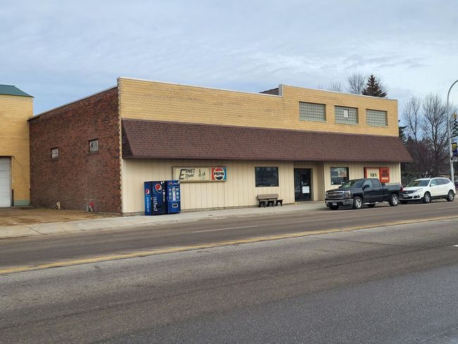 Front W/Vacant building to left | Image 6