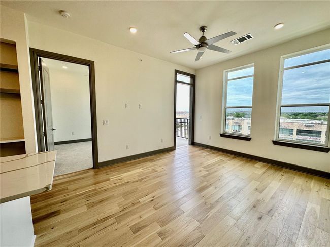Spare room with ceiling fan and light hardwood / wood-style flooring | Image 10
