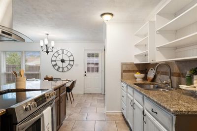 Granite Countertops with Open Farmhouse Shelving | Image 3