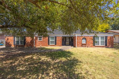 View of front of home with a front lawn | Image 1