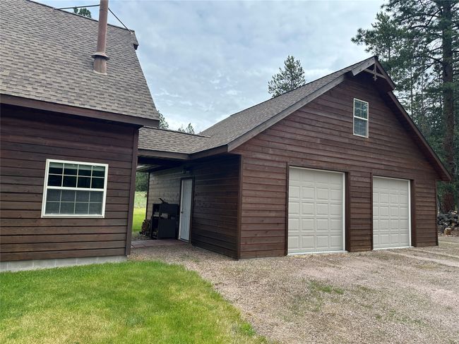 Garage built in 2017 30x25 with golf cart door | Image 45