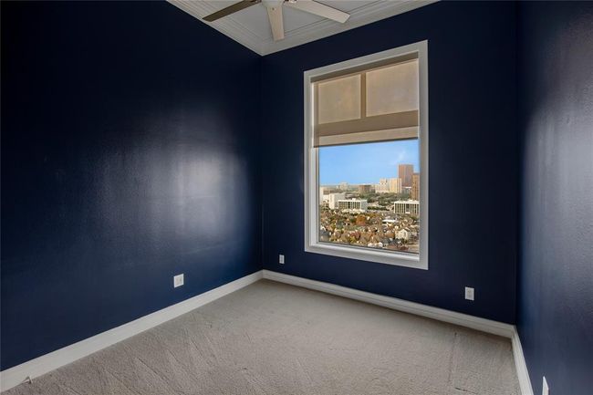 The secondary bedroom has the large window with an amazing view along with letting in an abundance of sunlight. | Image 24