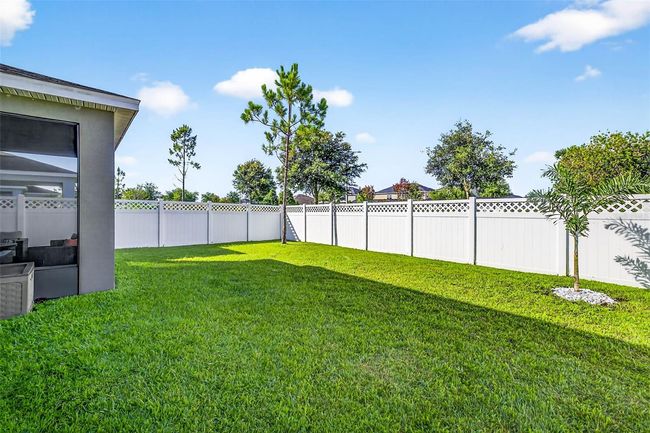 Add an extended lanai, pavers with firepit, pool & create your own outdoor space! | Image 31