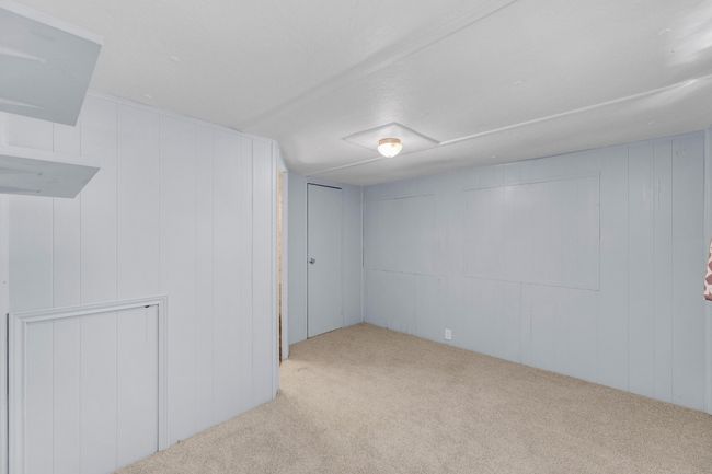 Finished below grade area with carpet floors | Image 20