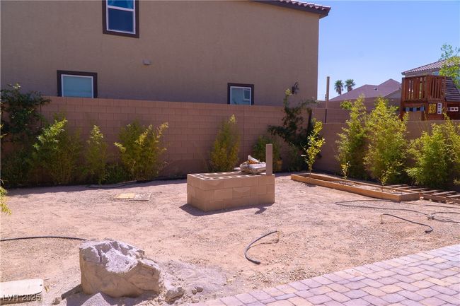 View of patio featuring a fenced backyard | Image 66
