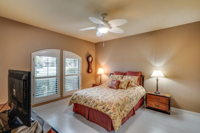 Bedroom with ceiling fan & walk-in closet | Image 28