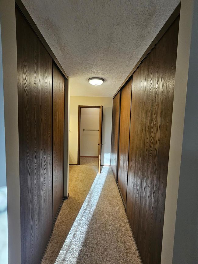 Primary bedroom closet space | Image 15
