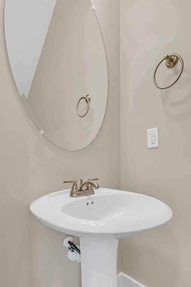 Convenient guest half bath on main | Image 15
