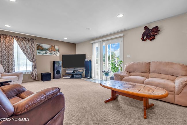 great room with 2 sliders to exterior | Image 20