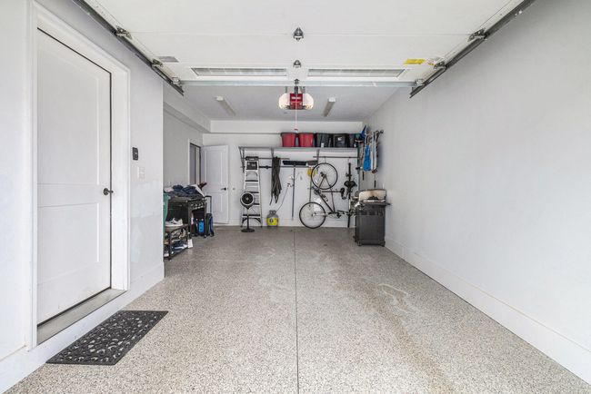 Deep garage with storage and epoxy floor | Image 32