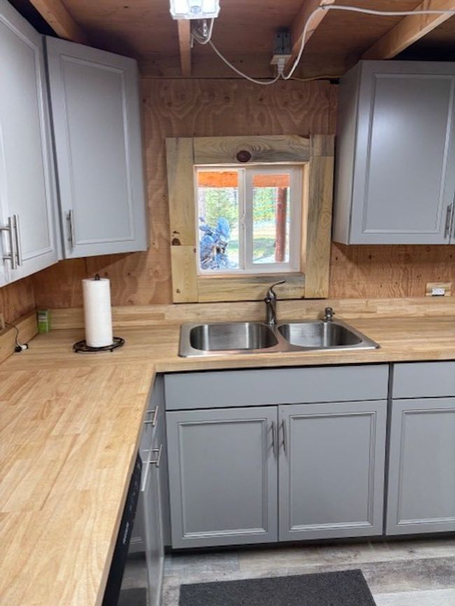 Kitchen featuring a sink and nice countertops | Image 15