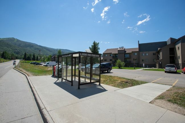 Bus Stop adjacent to complex for quick access to Steamboat resort. | Image 32
