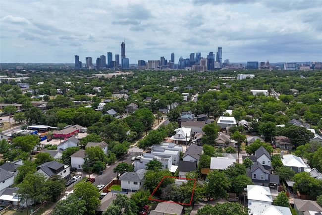 View of property location featuring property parcel outlined and city skyline | Image 7