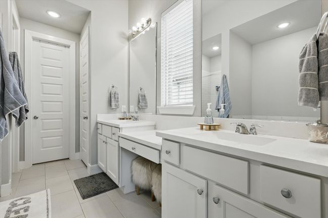 Bathroom with vanity, tile patterned flooring, and recessed lighting | Image 14