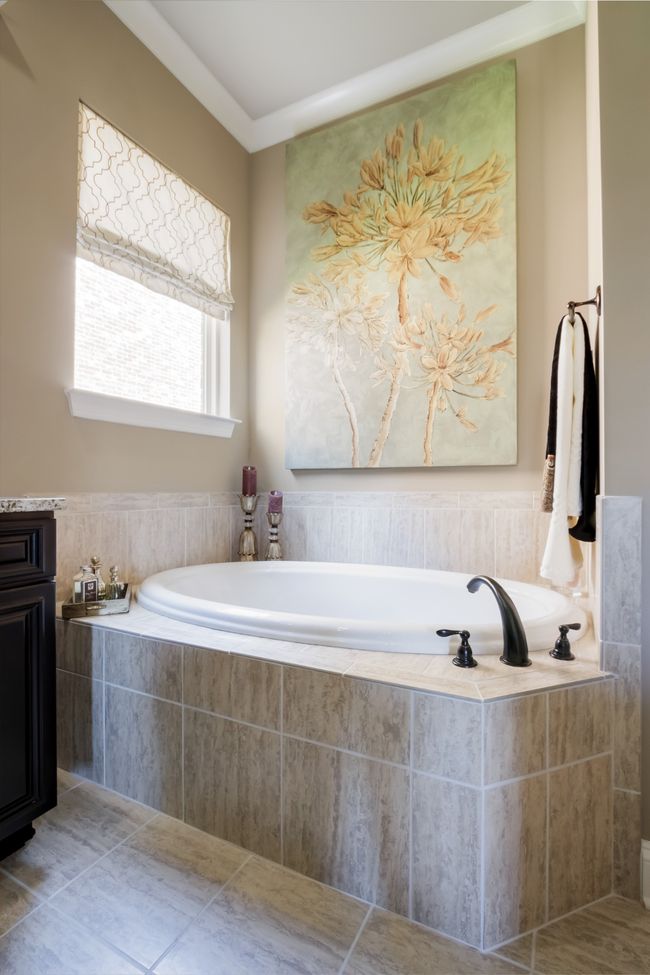 The tub is the perfect place to unwind after a long day. | Image 36
