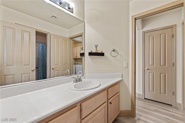 Bathroom with vanity and wood finished floors | Image 24