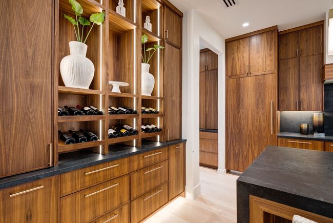Wine cellar with light wood-type flooring and recessed lighting | Image 8