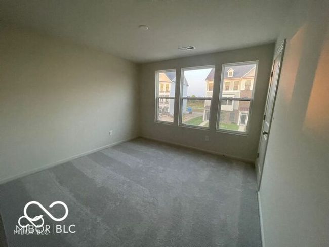 carpeted spare room with baseboards and visible vents | Image 20