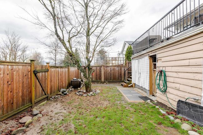 Fenced backyard featuring a gate | Image 32