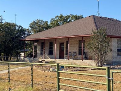 View of front of house with a front lawn and a porch | Image 2