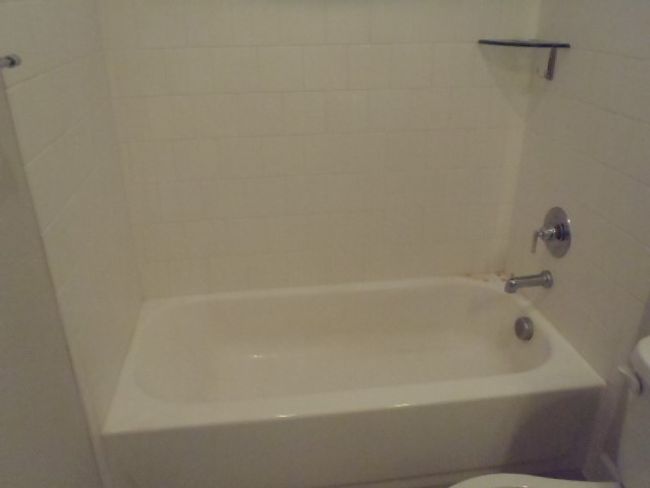 Full bathroom with toilet and tub / shower combination | Image 38