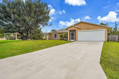 585 Nw Turton Terrace, House other with 3 bedrooms, 2 bathrooms and null parking in Port St. Lucie FL | Image 1