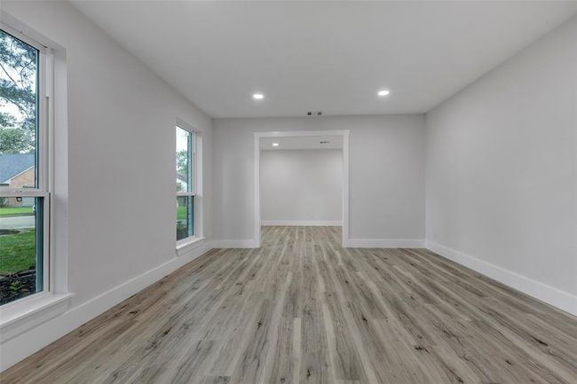 Expansive family room can be used as home office /study or downstairs game room. | Image 24