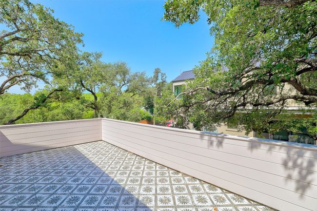 Balcony with a patio area | Image 22