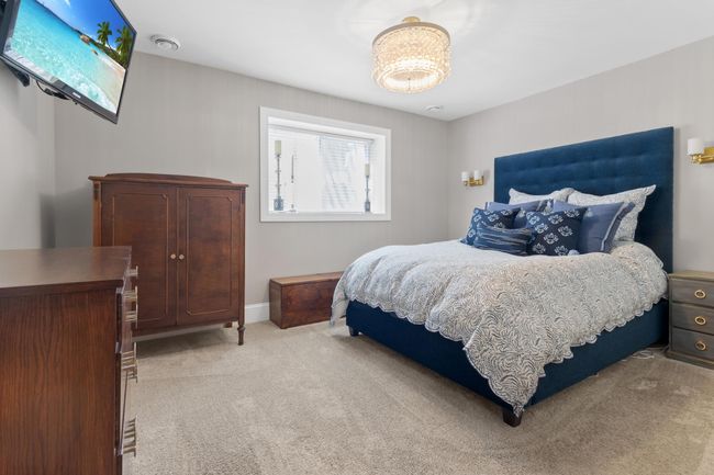 Bedroom #3 in lower level is a light-filled, peaceful retreat for guests. | Image 19