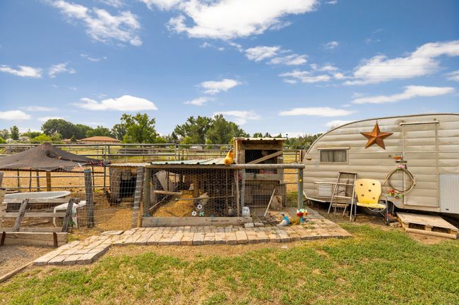 View of yard featuring an outdoor structure and exterior structure | Image 23