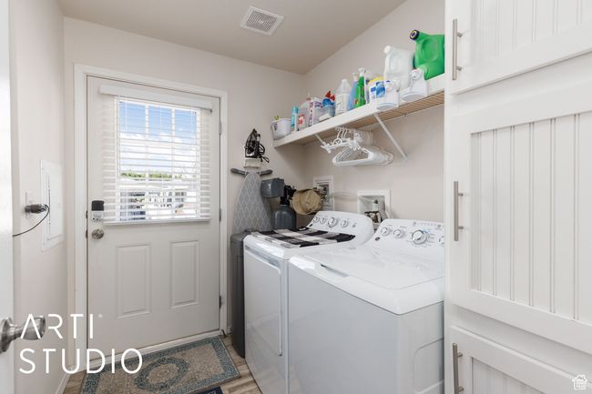 Laundry room with washing machine and dryer | Image 14