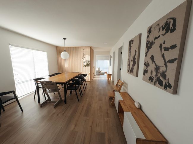 Dining room with wood finished floors | Image 8