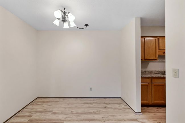 Dining space includes Fresh Paint and New LVP Flooring | Image 8