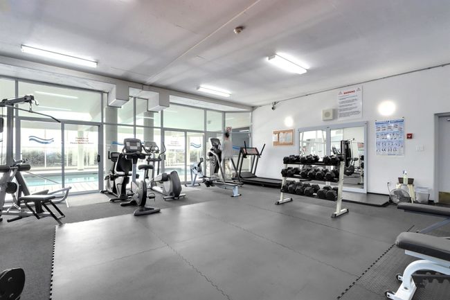 Gym featuring expansive windows | Image 24