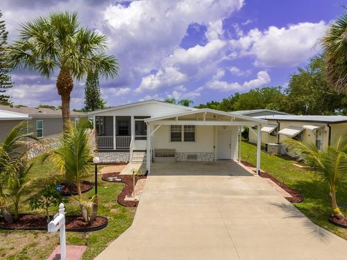 971 Laurel Cir, Barefoot Bay, FL, 32976-7298 | Card Image