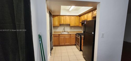 b-371 Ne 57th Ct, Oakland Park, FL, 33334-1754 | Card Image