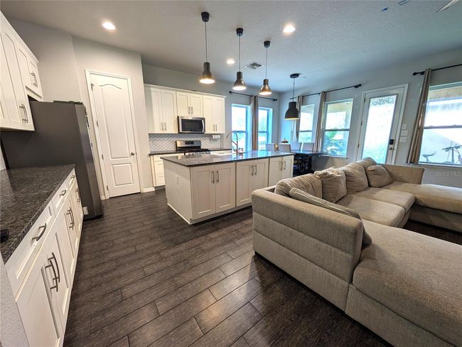 living room and kitchen | Image 15