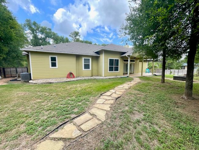 Back of house with a yard, a patio area, and fence | Image 25