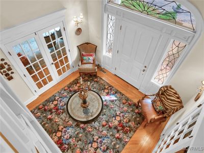 Front door with leaded glass windows sourced from the Manor House of Secretariat’s birthplace | Image 3