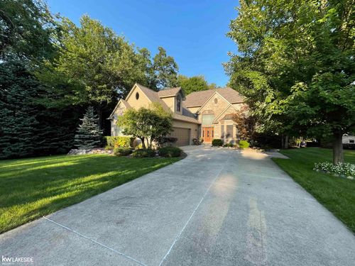 1440 Woodbridge Ln, Wixom, MI, 48393-1673 | Card Image