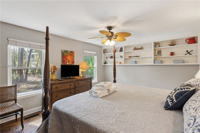 Large primary bedroom with spacious double closets, ample storage, and ensuite full bathroom. | Image 47