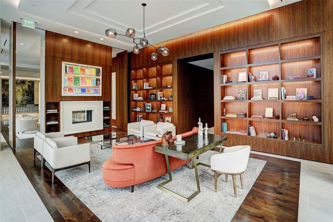 The style and ambiance of the building is unmatched in the city. This library common space is home to community happy hours and breakfast meetings. | Image 28