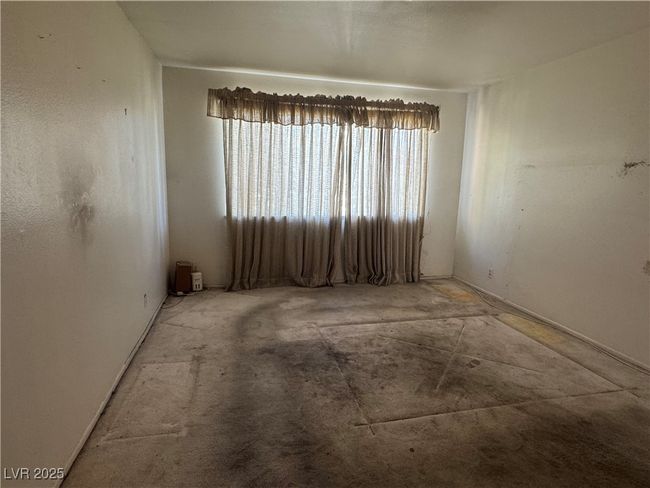 Primary room with baseboards | Image 8