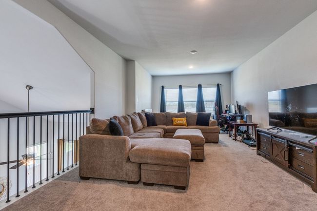 Living room featuring light carpet | Image 17