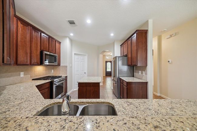 The meal preparation and washing area triangles help make cooking and cleaning easier. | Image 12