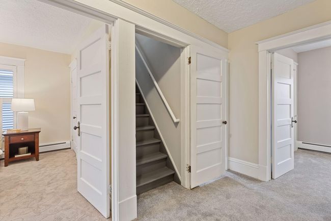 Travel to the second level to find three well-proportioned bedrooms. | Image 21