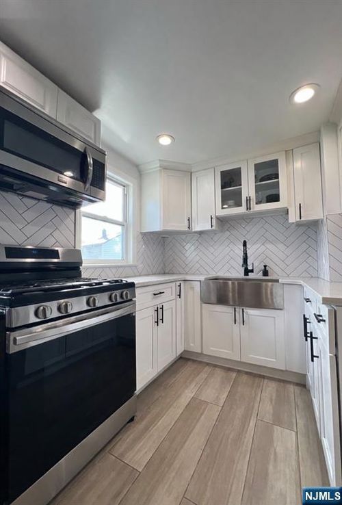 2 Macarthur Ave, Lodi, NJ, 07644-3721 | Card Image