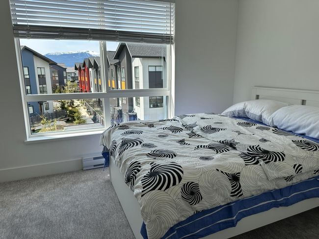 Bedroom with carpet flooring | Image 22